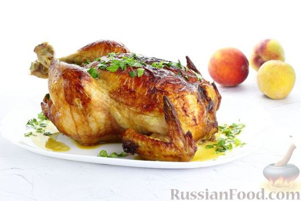 Курица, фаршированная персиками и чесноком (в духовке)
